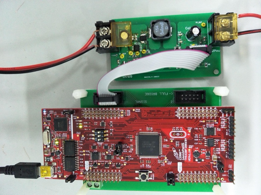 Custom DC-DC buck converter PCB wired to a TI C2000 LaunchPad